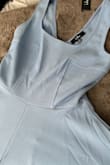 Thick material is okay because it's winter where I am. I will wear it with a jacket. I wear a size 10 or medium and it fits true to size. - Phyllis W.