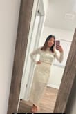 Fits perfectly with the right amount of stretch. I'm not one to wear sequins, but it was perfect for New Year's! You could even wear the top separately with some jeans! - Jasmin P.