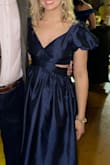 I love this dress! I can't say enough good things about it! It fits me perfectly! I used the size helper on the website and it helped me figure out if I needed an XS or a S. I got so many compliments all night! Definitely recommend this dress to everyone! It's so flattering!! It's hard to tell from pictures because of the lighting but the fabric was a really nice quality! - Mabry C.