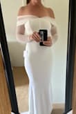 This small fit perfectly.  If I keep it, I would probably bring in the mesh sleeve a little in the back, as the dress is clearly made to either sit off the shoulders or on them.  I love the structure in the bust!  Very good quality material as well.  This is definitely in the running for my dress. - Sarah B.
