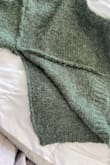 I decided against my better judgment to keep this sweater even though it was short. Sure enough, when I wore it for the FIRST time to work, a colleague gave me a heads up that the side of my sweater was open. I didn't understand what he meant until I looked and the entire side of the sweater was completely unraveled. - Parul M.