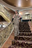 I bought this dress for a Gatsby-themed Gala. It was perfection. The fit is so perfect, and it has stretch/give so you don't feel like you can't move in it. I absolutely loved wearing this dress. The straps are adjustable, which I've noticed is the new trend for these kinds of straps. I personally dislike that, but it's very easy to cut the strap and restitch it without the extra fabric and metal bra adjustment. I just find that piece tacky. In the photo of the back of this dress that I uploaded, I did have it pulled up a little, so it looks a little gathered in my back area because it is. But you get the gist of the look. - Kelsey P.