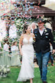 I absolutely loved this dress! My husband was so happy to see me in it at our First look and guests thought it was much more expensive than it was. I wish I could get married over again because I would pick this dress over and over. - Jeniffer G.