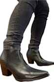 These boots are very well-made and stylish. The heels are sturdy, I was even able to run and kick in them. Because they are pointed shoes, it's a tighter fit. I would recommend thin socks or a size up if you want to be more comfortable. I love these boots very much! - Ariel M.