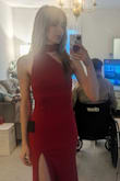 I love the fit of this dress. I typically wear a zero in structured dresses and the XS was perfect. The asymmetrical back and high neck really balanced the classy vibe with the spicy vibe. - Thalia B.