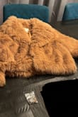 I love everything about it. The color, the fit, the wide collar, and that it feels so very soft. It can be dressed up or down and easy to style.
Arrived 2 days from placing the order. Very pleased. - Karen M.