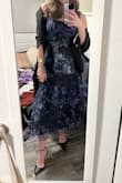 This dress was on my wishlist for a while! I finally had a reason to need it. I wore it to a winter wedding, and it was perfect. I saw the other reviews to size up, so I ordered a medium. It was a little big in the chest, but it still worked. I think a small one would've been too tight. The only issue I really had was trying to get the wrinkles out from the packaging. I tried to steam it, but it didn't really work. - Maria M.