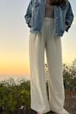 I wore these pants on vacation in California. The perfect mix of a summer pant while still being cute and classy. They were a little short on me, but it still worked. I washed them once and air dried them. This made the pants shrink! The inside liner is now inches longer than the actual pants. It's a mess. - Maria M.