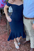 I absolutely love this dress and I have gotten so many compliments while wearing it. I wore it to two of my cousin's weddings. It has the perfect stretch which sucks in the stomach area. It is snug but it does not feel too tight. I love the shape of the dress and the flare on the bottom. It was very comfortable to wear all night and dancing. I will definitely wear it again! - Nicole F.