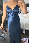 I was very excited to try it, but it fits weirdly around the chest area. I'm probably too small-chested for the dress, but it didn't fit me well at all. The picture looks better than it was in person, but the fabric is slightly bunched under the armpits as well. - Karsyn G.