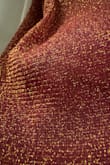 I wasn't expecting it to fit as well as it did. It doesn't drag on the floor and neither have stepped on it, I am pretty short so I am glad. I love the gold sparkles as well as the material on the dress. Overall it is very lovely. - Brielle D.