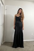 This dress was a perfect fit that I needed for a black tie wedding! It's fitted all the way down to my mid-thigh and then fans out a little to make the skirt a nice long length. Perfect for showing just a little of my shoes and being a floor-length dress. There is also boning under my arms on each side to offer support in the bust; Great touch! - Abigail M.