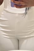 I've purchased SEVERAL jumpsuits and dresses from Lulu's with no disappointment. However, I was not thrilled with this item. White isn't my color but purchased it for an all-white affair. The lining/seam in the front appears to have extra material which is very noticeable. Unfortunately, there is no way to adjust it or remove it. I'll have to return it. :( - Dana B.