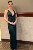 This jumpsuit is beautiful and comfortable. The elastic back straps helped keep the front tight. I wasn't worried about my boob popping out; that is a big deal with a low cut! - Amanda M.