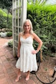 I'm petite at 5'0 so the dress was a bit longer than I would've liked, but it suited the purpose. I wore this to my bridal shower. Loved the pockets. For me, the midsection and top were a tad too tight, but it was bearable. Tried on lots of other dresses for the event from Lulus and settled on this one and was very happy with it. Got lots of compliments. The dress lace was high quality and more thick than I imagined. I wouldn't take it on a plane though if you're worried about space since it definitely weighs more than a lightweight dress. - Stacy G.