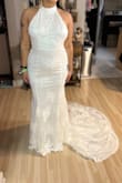 As another review states, the dress is too heavy so it sags and doesn't sit right. Otherwise, it's BEAUTIFUL and I am obsessed with the train. It fits perfectly from the stomach down, booty POPPING, and my back rolls don't show! The boob area did feel a little loose, once again, because it sags. This is my runner-up in case I don't find another dress, but it will need tailoring and body tape so it sits right. - Diana C.