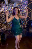 Beautiful dress! It's just like the picture. I had some much fun in this dress and received lots of compliments. It's well made, good material, etc. I am 5'3, and it was a little shorter than expected. Overall, it's a must. I would get another one in a different color. I love it. - Nency M.
