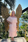 I attended a friend's wedding in Puerto Vallarta Mexico. One of the grooms requested we wear neutral colors. I shopped high and low for a beautiful, comfortable dress with no cutouts. I am in my late 50s. This dress was perfect. I could wear a strapless bra. A lot of dresses have very low cutbacks. I danced all night and I was completely comfy. I received so many compliments. I will get a lot of wear out of this dress. The price was perfect as well. I recommend this dress to anyone considering buying it. - Beth V.