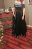 I purchased this dress for my daughter's wedding. It is absolutely perfect! The quality, fabric, fit, and price! The color is gorgeous! The pictures hardly do justice to the true beauty of this emerald color. Absolutely love, love, love this gown! - Rebecca C.