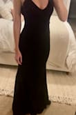 I absolutely loved this dress. The zipper is a little tough, I had to have help and it still took a bit. It's a little snug in the chest, but the size small was way too big. The fabric does snag, so make sure to protect it when it's hung in your closet. - Katy E.