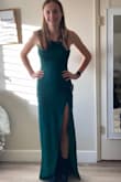 I chose to wear the other dress but this one fit her like a glove. She is thin and athletic. Nice, thick material. True emerald green. - Greta P.