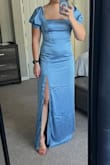 The dress is beautiful, fits well, and is delicate and elegant. - Fernanda R.