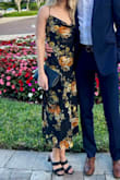 I wore this as a guest at a wedding and it fit perfectly. I have a smaller chest and the straps were easily tightened if you pull in the back. Overall, I got a lot of compliments and it was a very slimming and chic dress! - McKenna K.