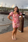 I said it ran a little small just because we had to order a size up to fit in the bust and alter the bottom to fit better in the hips. Comfortable dress to dance all night. My daughter received many compliments as always with Lulus dresses. - Jill B.