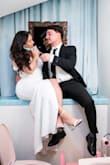 Loved it for my elopement, but I did find the back a little too loose. It would just need an adjustment. The photo shows the back piece that seems loose. - Melissa H.