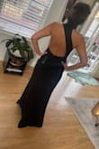 It is a magical dress that highlights your body. Very elegant. The back neckline is unique and original. - Maria M.