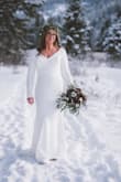 This dress is beautiful! It's timeless, elegant, and simple. It fits fairly true to size, but it ran a little large on me (as I'm in between sizes and because I didn't want to size down, given my height or shoulder width). I spent another $50 or so on some alterations; it was absolutely perfect, but it shouldn't be an issue or need to [be done] for brides of a more average height and smaller build. The quality of the material was good; it was strong and durable, with a good lining. It also has a bit of stretch, so it's quite forgiving. I still recommend some good shapewear to smooth things out and remove any panty or bra lines. Overall, really great dress and experience with Lulus. - Natasa D.