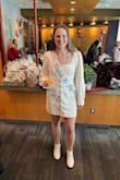 I wore this dress for my January bridal shower and it was perfect! Well made. My only problem was it was a little tight in my rib cage as the waist is higher than your natural waist! I ordered up a size for my giant ribs but I think many people would get away with their normal just a lil snug! - Kristen M.