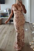 Ultimately went with another dress due to mobility restrictions. Had read some reviews about how delicate it is, especially with the straps. I wanted something I could actually dance in. I know I was about to go crazy so no need to have a Janet moment in the middle of the reception. It's beautiful though. It's also a daytime wedding so it wasn't too fitting for the occasion. This would be great for a fancy ball or something. - Masiel M.