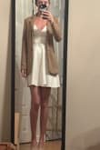 The material is nice and thick so you don't have to worry about sheerness with it being white, and fits beautifully on. The open back adds a bit of spice to the dress and is really fun. Makes my legs look 8 miles long! I think it can be really sweet with a little coat or blazer over top too. Always love the quality of Lulus dresses! - Hailey G.