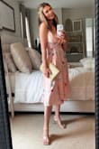 I love this dress! Runs true to size and the colors are just so pretty. I wore this to my son's graduation and got tons of compliments. Don't pass this one up. - Michelle B.