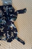 The material is beautiful but the dress is poorly made. The the straps are not centered above bust area and one strap is narrower than the other. I really can't even wear it. - Linda D.