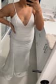 The dress was amazing and fit true size. Got some alterations from the bust to make it sexier. - Isabel