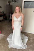I ordered a large even though I needed an XL (they were out of stock). I am a 41 bust, but 38Cs fit perfectly. So I was hoping I could squeeze into this. I could, in fact, not. It was loose around my hips, so I would have needed to get that taken in along with getting the dress hemmed, due to length. The dress was great material, and I'm really bummed it didn't fit. - Kassidy K.