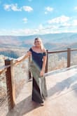 This dress is super affordable and BEAUTIFUL! Amazing quality. I wore it to a wedding in Tennessee and it was great! I ordered a Medium and I am 5'6, 160 lbs. - Christina K.