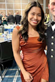 The rust-toned color beautifully complemented my tan skin, and the floor-length design paired perfectly with my 3.5-inch heels. I received numerous compliments about this dress. However, the only downside was a slightly loose shoulder strap. I used fabric tape to keep it in place. Overall, it's a great choice for any formal event. - Joan M.
