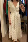 I really wanted to love this dress because it was something different than just a plain white dress, but unfortunately, the size XS was still too big on me. I planned on wearing it to my bridal shower but this dress does not work well with my frame and body type. I am petite and pretty small-chested. The plunge neckline is a little too low for my taste and the cinched waist sits too low on my torso and looks awkward. - Anne K.