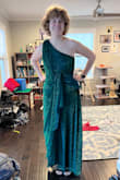 The dress fits me very well. I love how I look in it and am excited to wear it to our friend's wedding next week. However, there are some major flaws in the stitching that diminish the dress quality. The sheer overlay is not cut evenly at all, and there are threads sticking out along most of the seams. First picture is me in dress; second is a collage showing the flaws. Fingers crossed I can find a tailor to mend it. - Beth S.