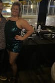 Bought both this and the Delightful Ways Magenta Sequin dress for my 40th birthday this year. I went with this one because I knew we'd be moving around. Dress was perfect for a night out of bowling and dancing. Fabric is stretchy, and the open arms allowed for tons of movement (see bowling pic!). Green is so pretty, I can't wait to wear it again. - Kira W.