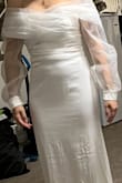 The sleeves were huge and the loose fit wasn't pretty on me. I wanted to love this dress but wasn't what I was looking for - Tanaesha L.