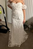 I loved this dress but the bust was too loose. I would have needed to alter it for the perfect fit. But it was absolutely beautiful and my #2. - Tanaesha L.