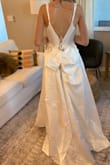 This dress was amazing!! The bow and the slit just made the dress. I wish it fit better because I would have kept it! - Elyssa H.