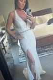 I ordered this dress for our 11-year vow renewal. It's comfortable, and the straps are adjustable for the top. It's a little long for me and since ordered I've lost some weight. So for that reason, I'll have it taken in and the length altered as well. It's beautiful, simple, comfortable, and affordable! I also had a belt sewn onto it. Makes a huge difference. I love it! - Johnna A.