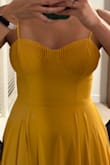 I always get S from Lulus and have had great success with the fit! This one ultimately fit fine but was much too large in the bust. I sized it down to a XS. It still fit, but the bust looked bizarre. I think the dress would really benefit from having cups or some structure to the bust. The color is absolutely beautiful though! The pics are of the XS. - Vindhya R.