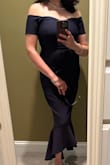 Dress is very flattering, and the spandex blends nicely and shapes the tummy and hip areas. Pairs very well with silver sandals and silver/diamond accessories. Tag states no ironing so I used a fabric steamer to smooth out the packaging wrinkles. Must be hand washed. - Ka S.