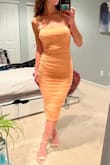The "metallic" in "metallic coral" is like a shimmery layer which is kind of cute but reads a little "young". Also, the slit in the back pulls outward instead of sitting flat. Maybe one size up would help with that though. Overall the dress isn't really for me, though. - Rosie V.